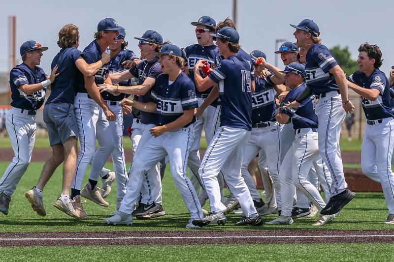 Oswego East celebrates the victory over Oswego in their Class 4A Romeoville Sectional final game.  June 3, 2023.