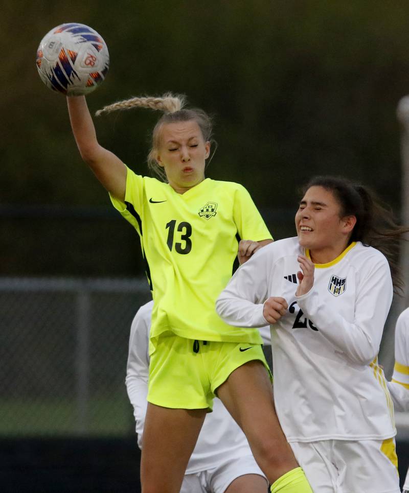 Richmond-Burton's Sydney Frericks and Harvard's Julie Silva battle for the ball during the Kishwaukee River Conference Girls Soccer Tournament Championship Match on Wednesday, May 7, 2025, at HRichmond-Burton High School in Richmond.
