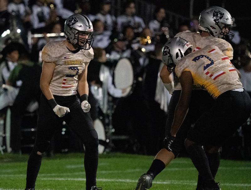 Kaneland's Johnny Spallasso (2) reacts after scoring a touchdown against Sycamore during a football game at Kaneland High School in Maple Park on Friday, Sep 30, 2022.