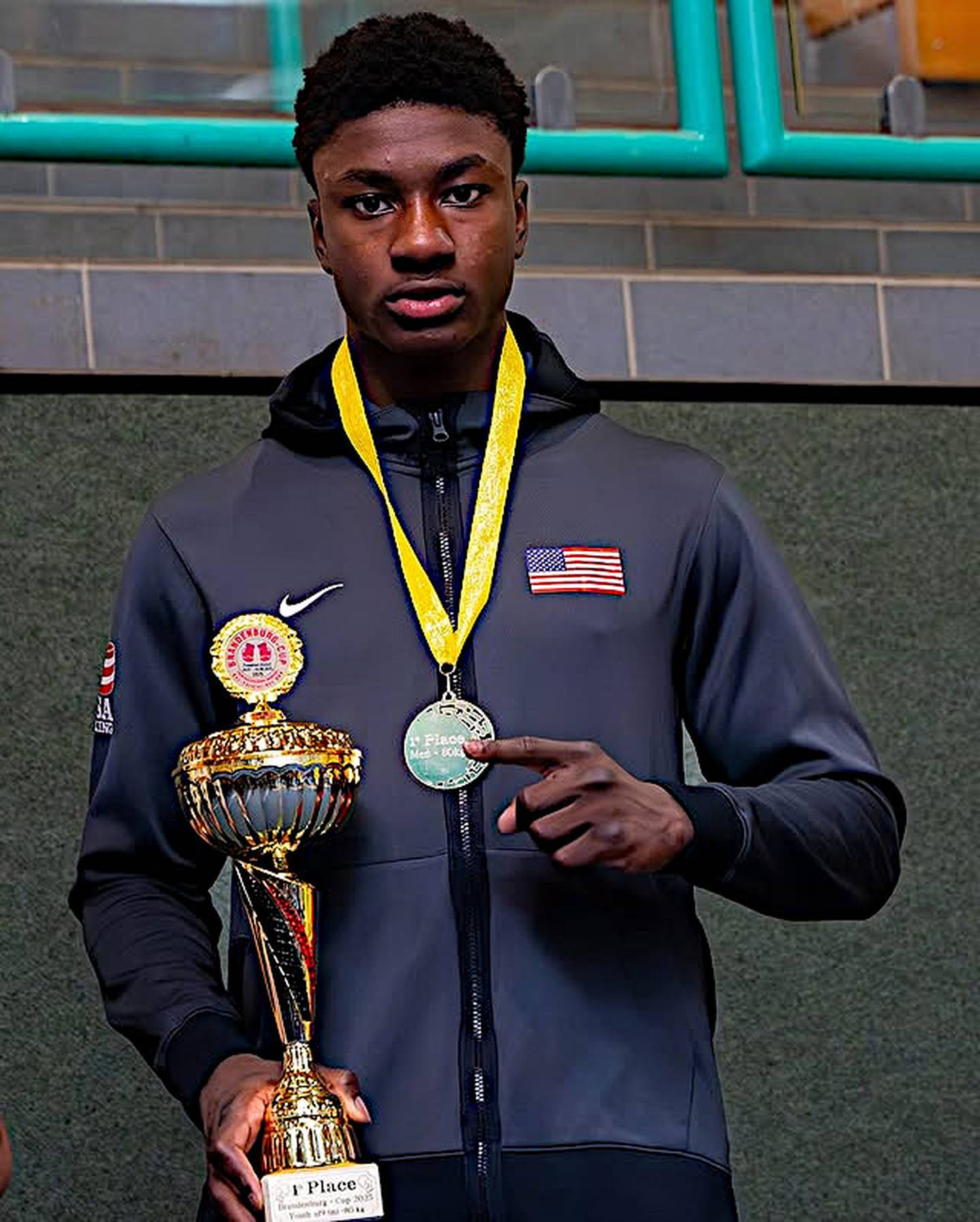 Joliet's JoJo Awinongya shows off his medal after winning the 80 kg weight class at the Brandenburg Cup in Germany.