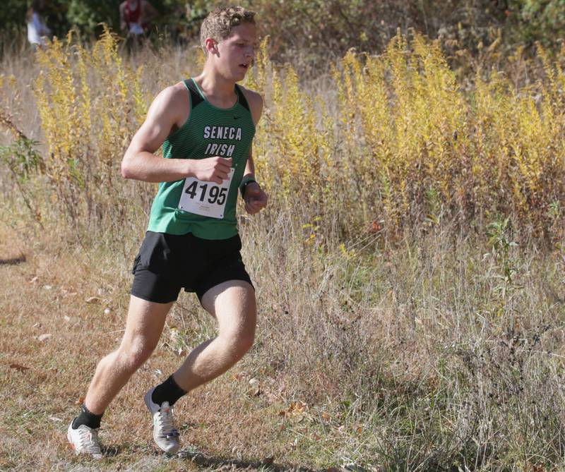 Seneca's Chris Poyner runs in the Class 1A Regional Cross Country boys race on Saturday, Oct. 22, 2022 at the Seneca FFA Farm in Marseilles.