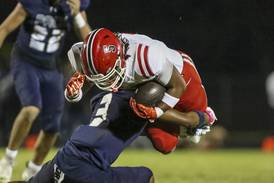 Photos: Yorkville football travels to Oswego for matchup with East