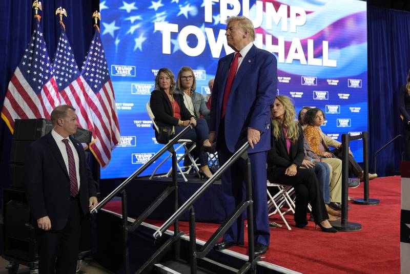 Republican presidential nominee former President Donald Trump checks on a person having a medical emergency at a campaign town hall at the Greater Philadelphia Expo Center & Fairgrounds, Monday, Oct. 14, 2024, in Oaks, Pa. (AP Photo/Alex Brandon)