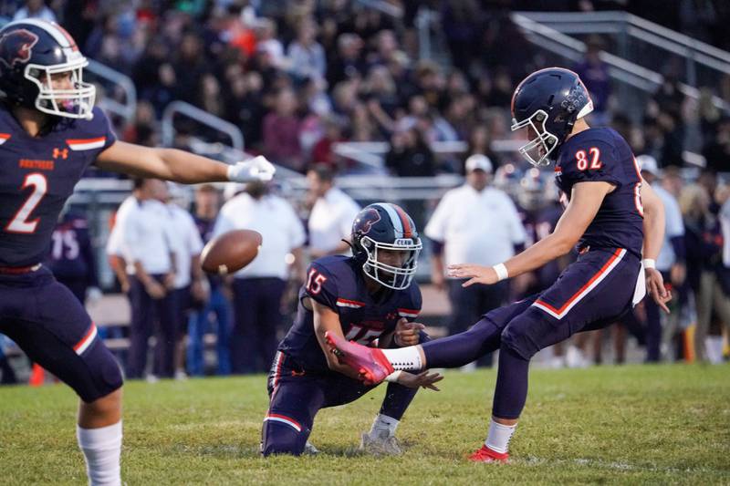Oswego’s Tanner Stumpenhorst (82) kicks an extra point against Plainfield Central during a football game at Oswego High School on Friday, Sept. 8, 2023.