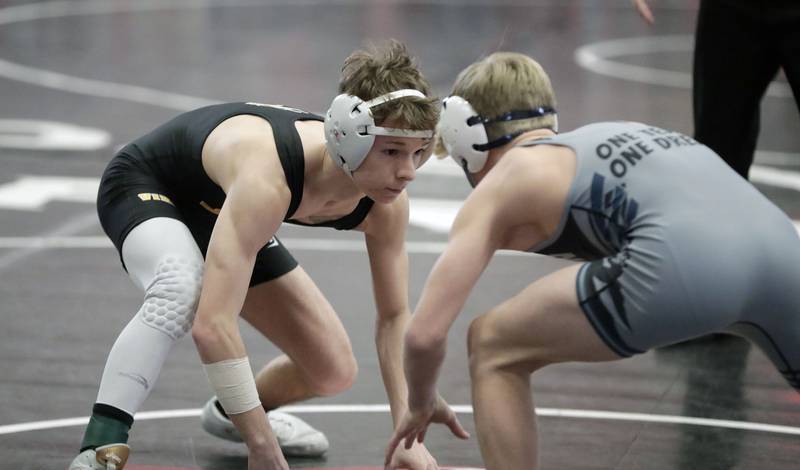 Fremd's Wiley Jessup wrestles Belvidere's Brayden Tuenissen at 106-pounds during the IHSA 3A Individual Sectional wrestling meet at Barrington High School Saturday February 12, 2022.