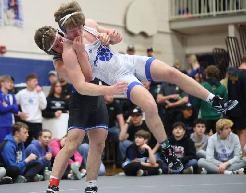 Princeton's Casey Etheridge wrestels Porta's Justin Zimmerman during the 62nd annual Lyle King Princeton Invitational boys tournament on Saturday, Jan. 10, 2026 at Princeton High School.