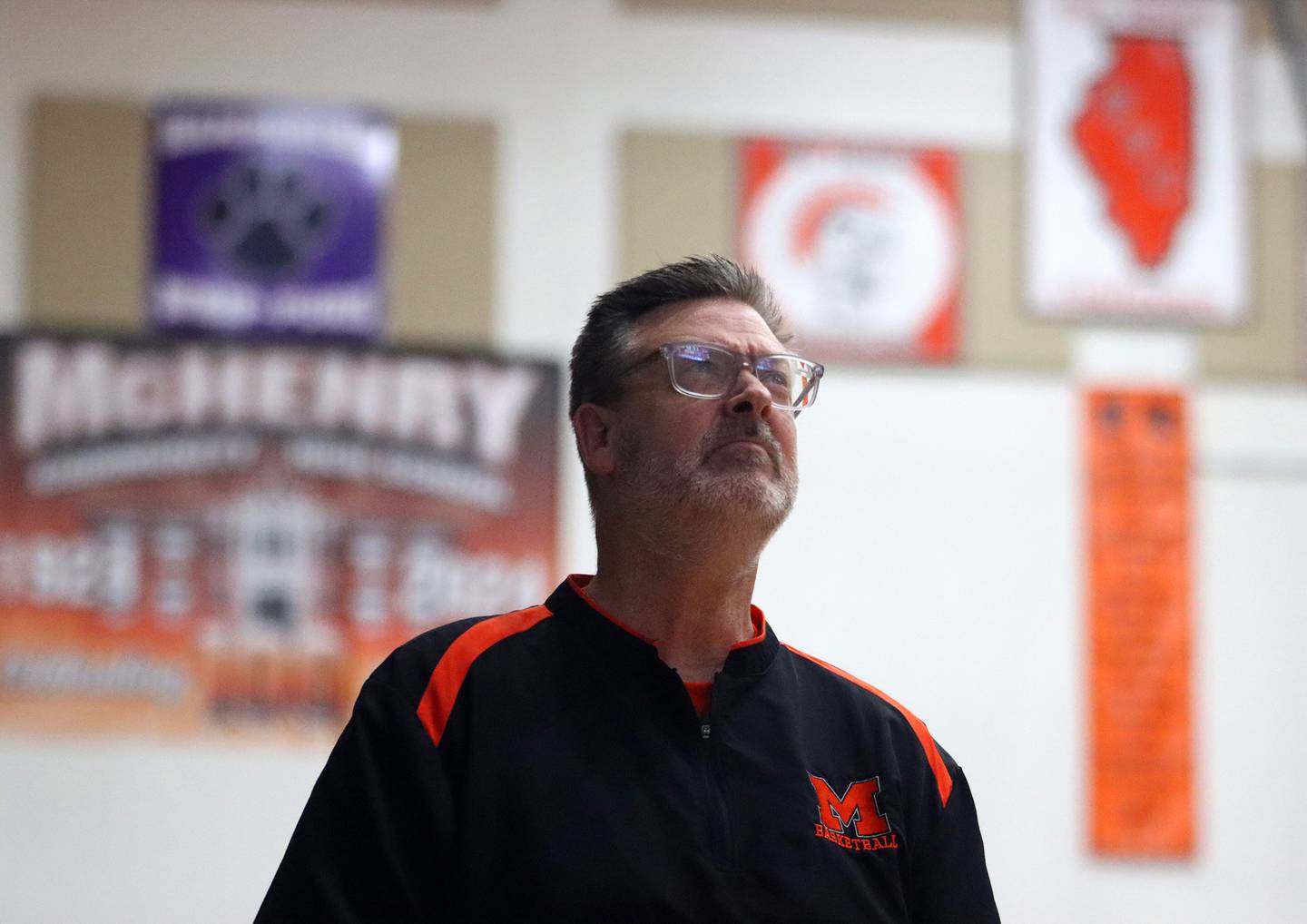 McHenry’s Head Coach Corky Card guides the Warriors against Jacobs in varsity basketball on Wednesday, Dec. 4, 2024 at McHenry High School in McHenry.