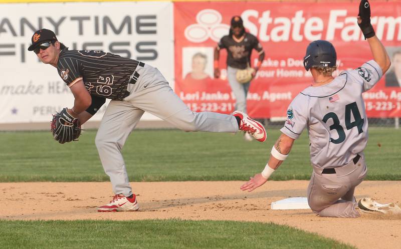 Alton River Dragons Bret Yarger is forced out at second base by Illinois Valley Pistol Shrimp's Kyle Gibson of Niles on Thursday, June 5, 2025 at Schweickert Stadium in Peru.