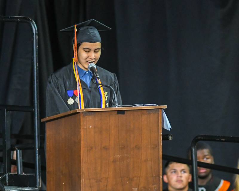 Alisha Cambari Saka recognizes the DeKalb School District 428 Board of Education and district aministrators on Saturday, May 24, 2025, during the Class of 2025 Commencement ceremony held at the NIU Convocation Center in DeKalb.