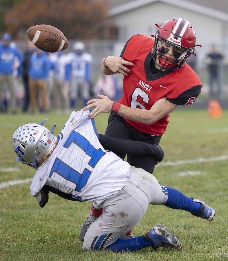 Amboy’s Ed Fry has the ball knocked away by Martinsville’s Ben Hiatt on a two-point conversion play Saturday, Nov. 9, 2024, in round two of the 8-man football playoffs.