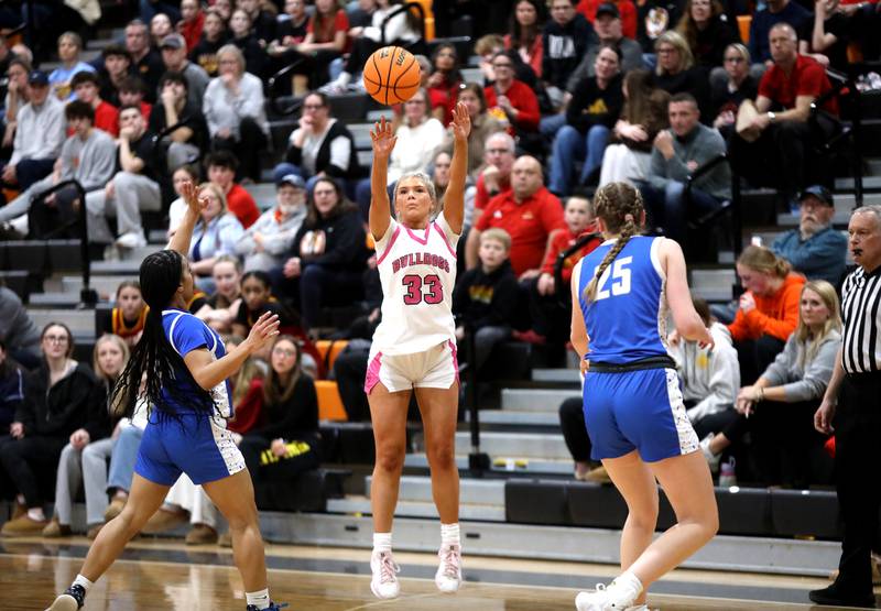 Batavia's Natalie Warner shoots three points during a Class 4A St. Charles East Sectional semifinal against Wheaton North on Tuesday, Feb. 25, 2025 in St. Charles.