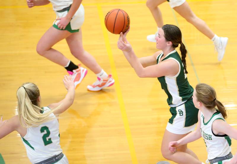 St. Bede's Ella Hermes passes the ball up the floor between Seneca defenders on Monday, Jan. 29, 2024 at Seneca High School.