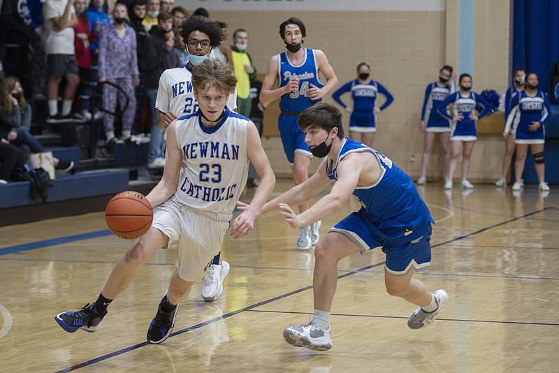 Newman's Lucas Simpson drives to the hoop against Princeton Friday, Jan. 14, 2022.