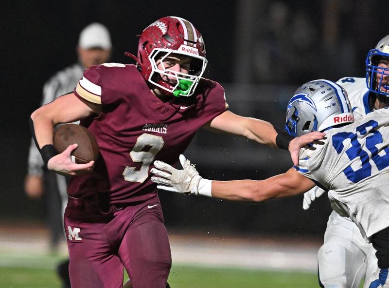 Morris' Caeden Curran (9) runs the ball during the class 4A first round playoff game against Woodstock on Friday, OCT. 31, 2025, at Morris.