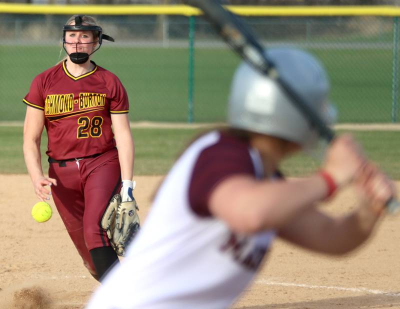 Richmond-Burton’s Madison Kunzer delivers in varsity softball at Marengo Tuesday.