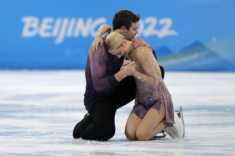 Alexa Knierim and Brandon Frazier, of the United States, compete in the pairs free skate program during the figure skating competition at the 2022 Winter Olympics, Saturday, Feb. 19, 2022, in Beijing.