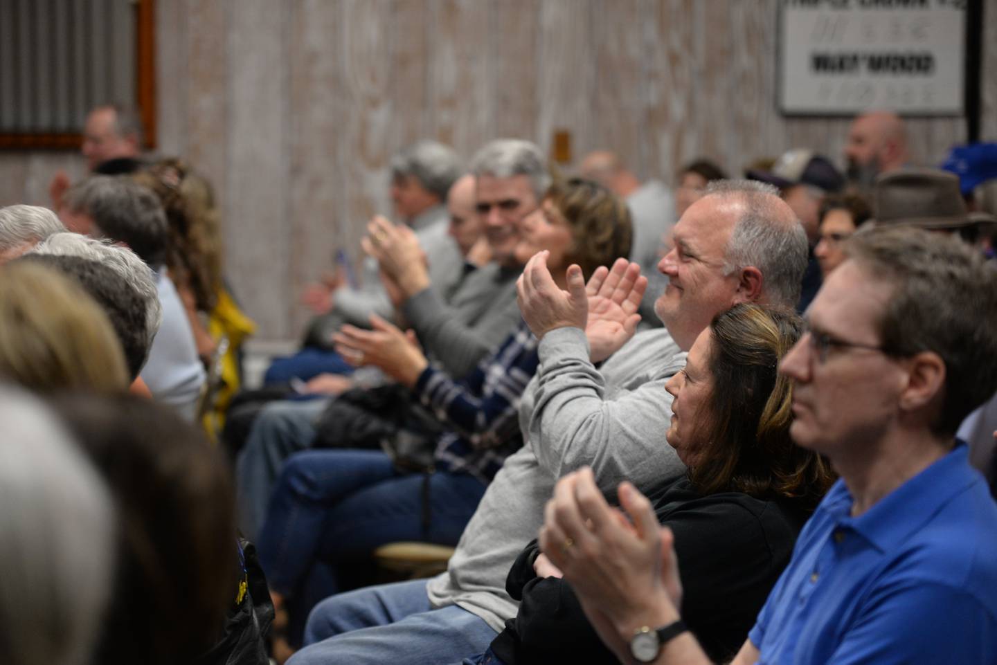 US Rep Sean Casten gets applause from attendees of the Downers Grove Town Hall meeting prior to the meeting being cut short due to consistent interruptions from people regarding the unrest with Palestinians and Israelis Wednesday March 19, 2025.