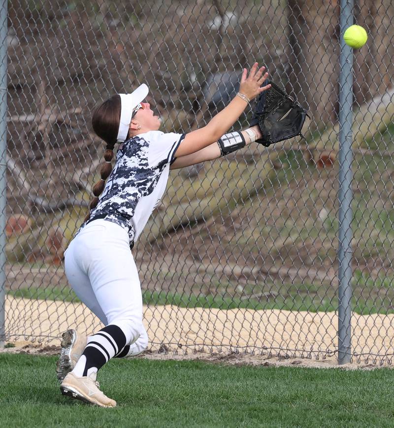 Kaneland's Gianna Cellini makes a diving attempt to catch a foul ball Tuesday, April 22, 2025, during their game at Sycamore High School.