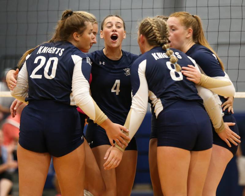 IC Catholic Prep celebrates a point during volleyball match between Nazareth at IC Catholic Prep.  Aug 29, 2023.