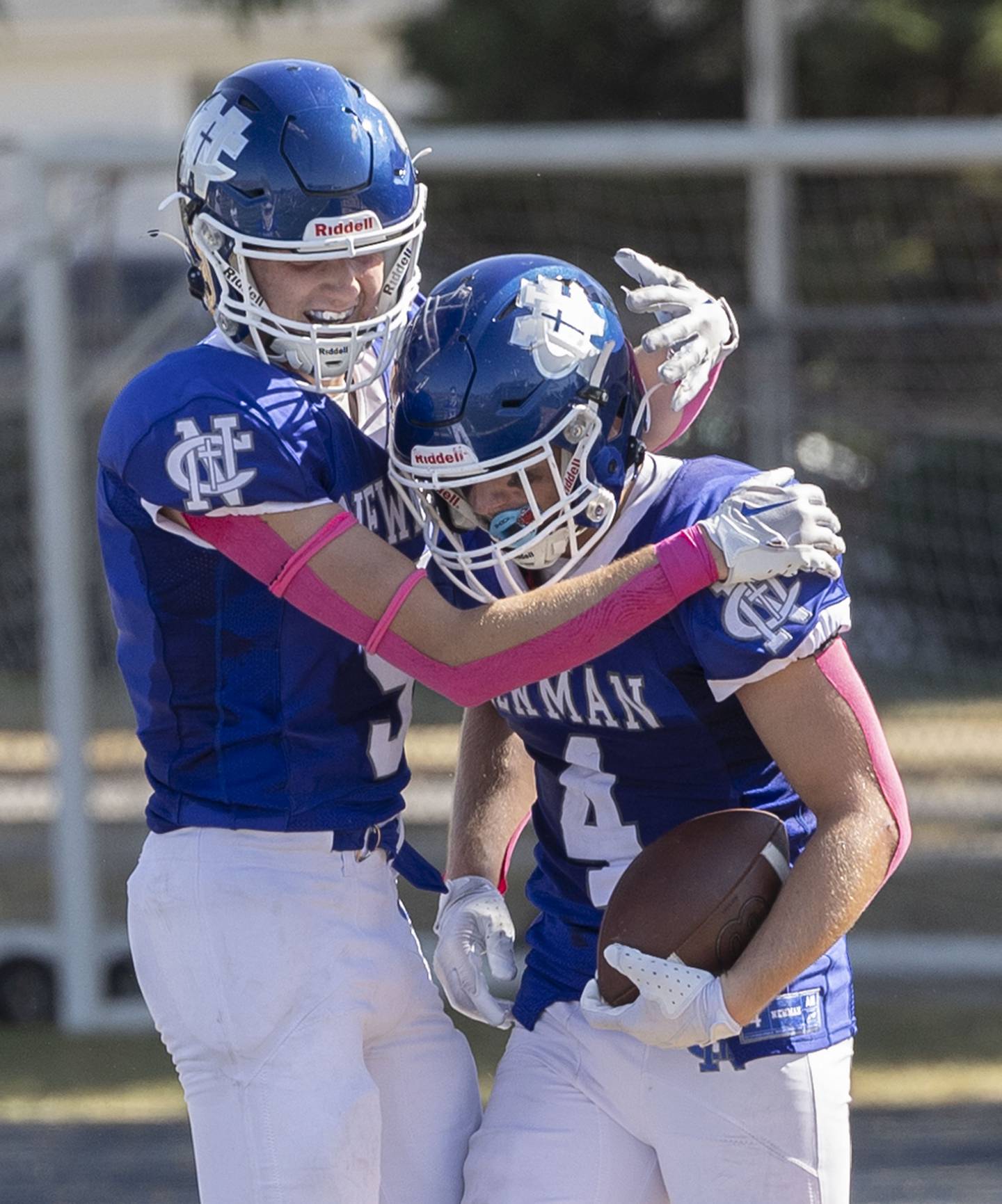 Newman’s Matthew Blackert is hugged by Newman’s Asher Ernst for a TD against Mercer County Saturday, October 4, 2025.