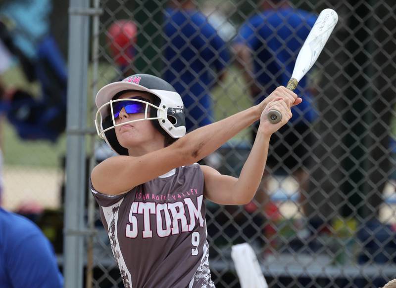 Kishwaukee Valley Storm's Madison Butler watches the flight of her ball Friday, June 27, 2025, during their 16u game against Northern Ice in the Storm Days tournament at the Sycamore Community Sports Complex.
