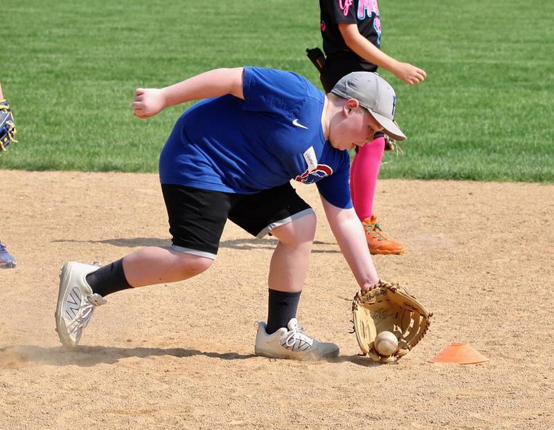 Jacob Eggers works on fielding drills during Wednesday's session of the Princeton Tiger Baseball Camp.