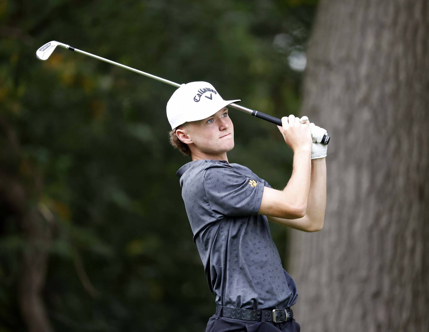 Michael Johansen of Wheaton Warrenville South watches his tee shot during the DuKane Conference boys golf tournament at Bartlett Hills Tuesday, Sept. 23, 2025 in Bartlett.