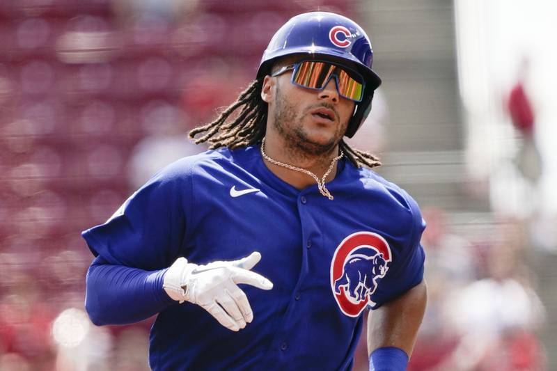 Chicago Cubs' Michael Hermosillo rounds the bases after hitting a two run home run during the second inning of a baseball game against the Cincinnati Reds in Cincinnati, Wednesday, Aug. 18, 2021.