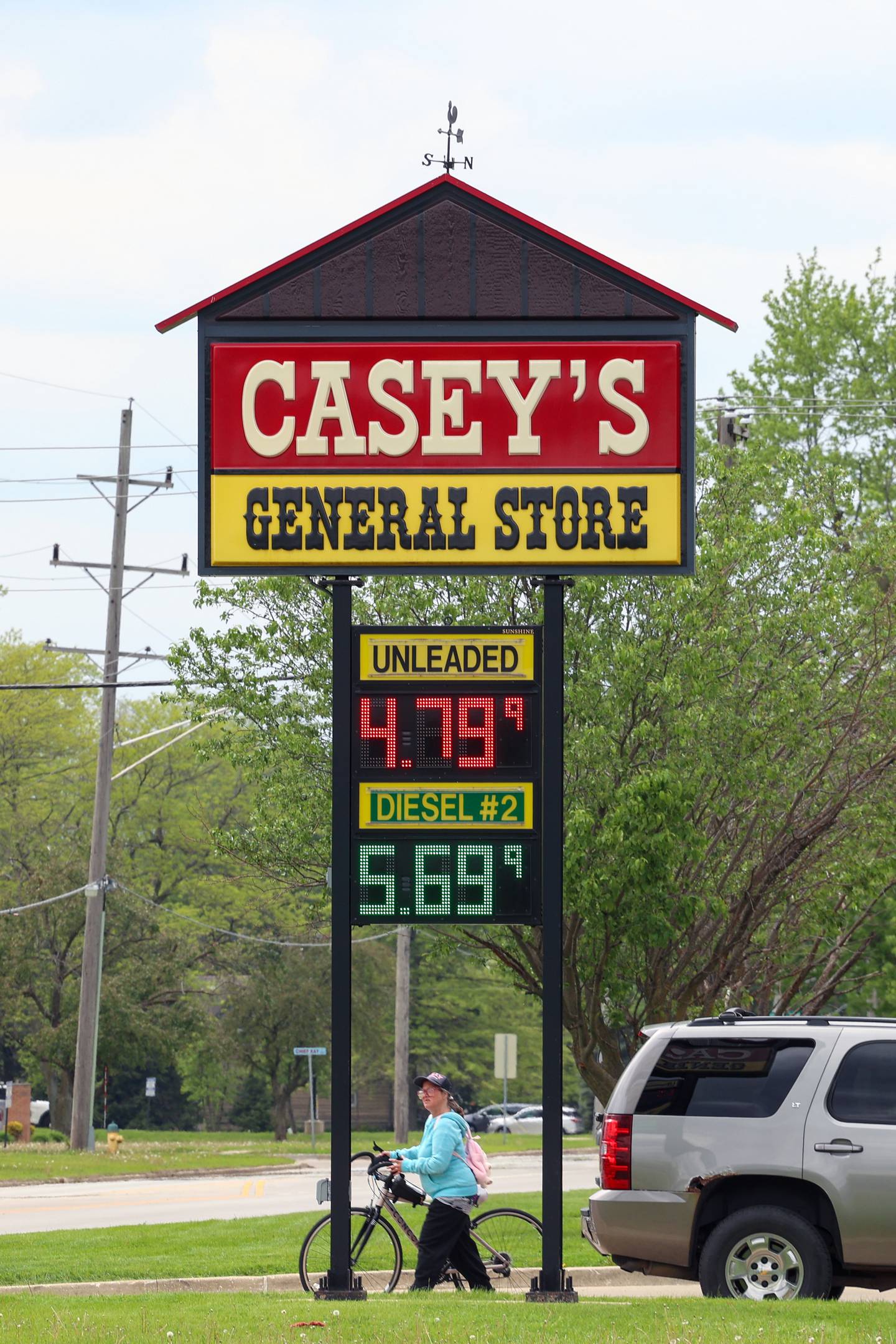 A cyclist leaves the Casey's on Jeffrey Street in west Kankakee on April 30, 2026, as gas prices continue to rise this week.
