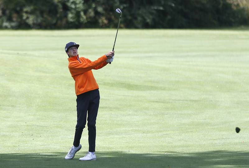 Jacobs’ Barrett Rennell watches his fairway shot on the 14th hole during the Fox Valley Conference Boys Golf Tournament. Thursday, Sept. 22, 2022, at Randall Oaks Golf Club in West Dundee.