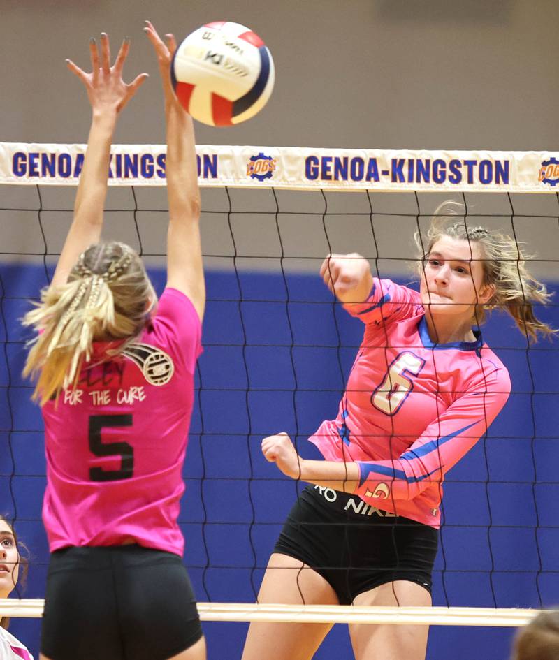 Genoa-Kingston's Kaitlin Rahn spikes the ball during their Volley for the Cure match against Oregon Wednesday, Sept. 21, 2022, at Genoa-Kingston High School.