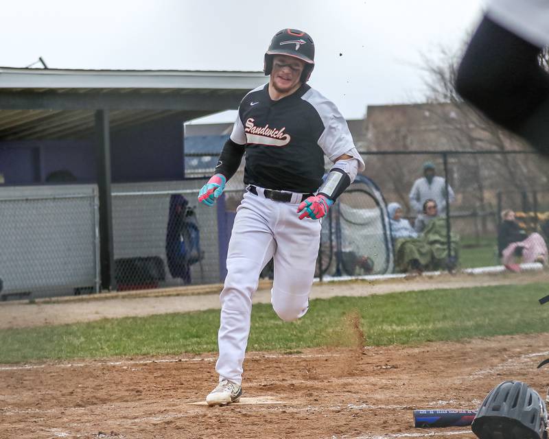 Sandwich's Jeffery Ashley (8) crosses the plate for a run during baseball game between Sandwich at Plano on Thursday, April 9, 2025 in Plano.