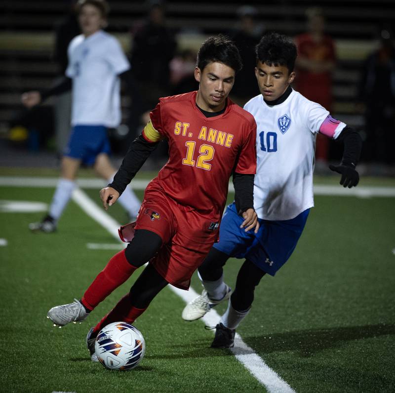 St. Anne's Erick Franco, left, controls the ball as Clifton Central's Matthew Salas, right, defends during a regional match-up on Tuesday, October 21, 2025.