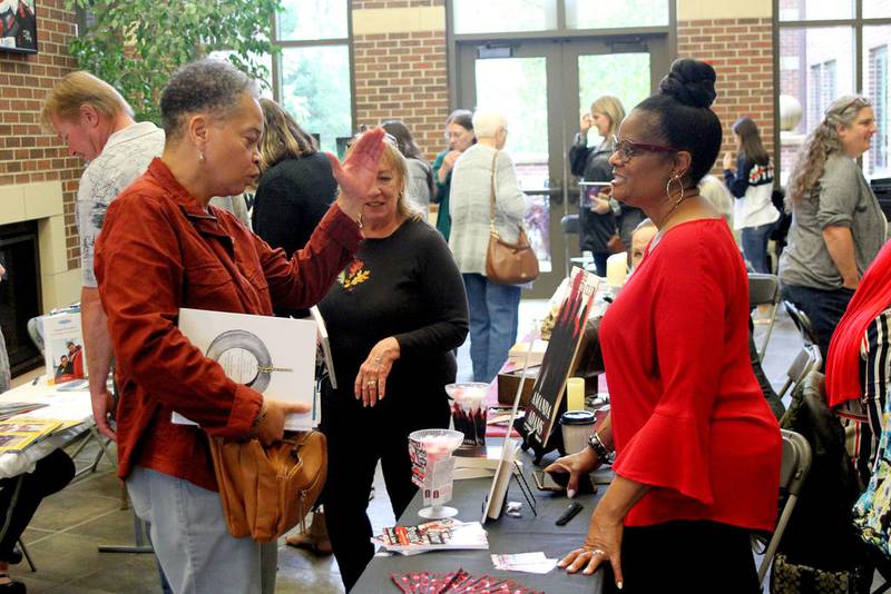 FILE PHOTO: Poetry, fiction and non-fiction authors set up shop in Oswego's Village Hall in September 2019 to sell their books and tell their stories to visitors at the eighth annual Oswego Literary Festival. The event featured authors, live readings and entertainment.
