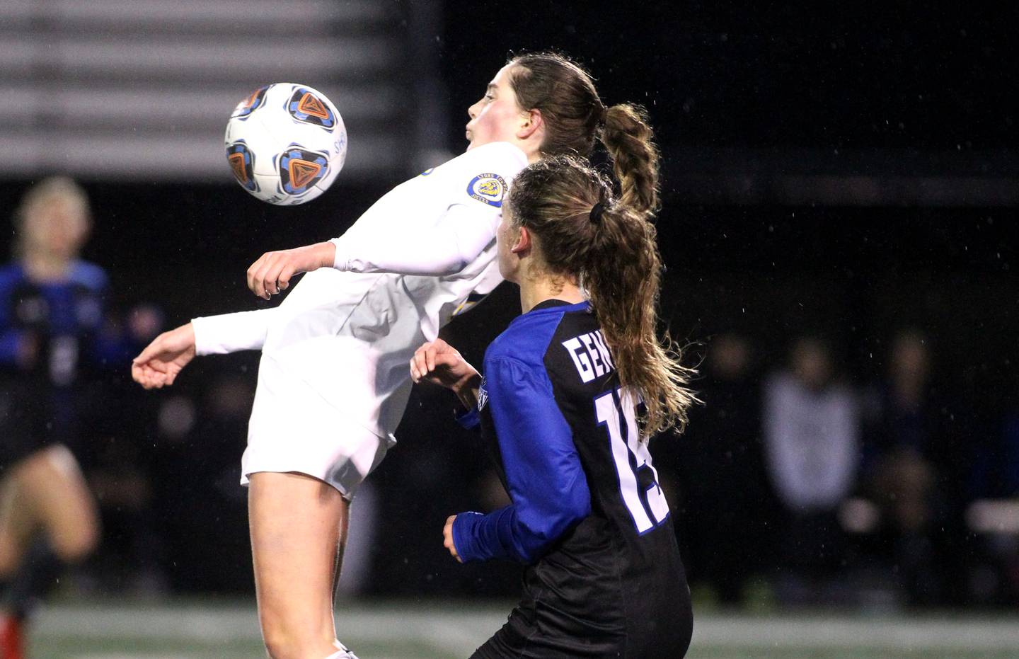 Lyons Township’s Caroline Mortonson gets control of the ball during a game at Geneva on Thursday, March 24, 2022.