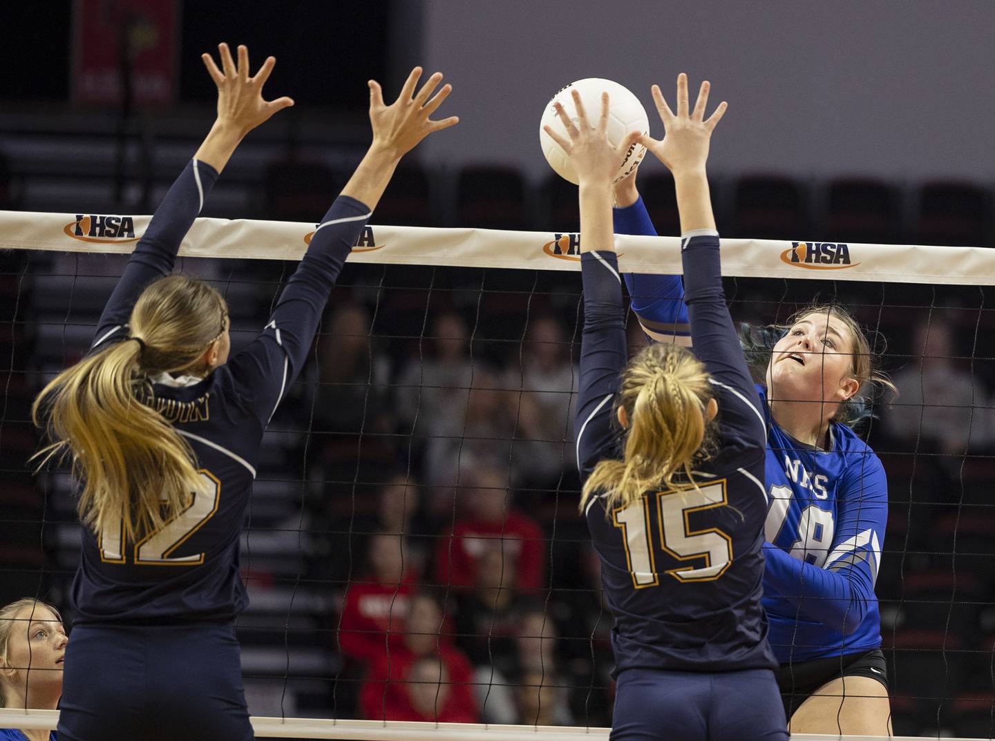 Newman’s Kennedy Rowzee plays a shot early in set one Friday, Nov. 11, 2022 in a class 1A volleyball semifinal against Aquin.