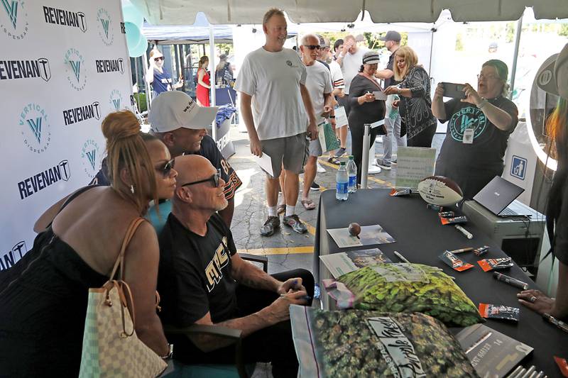 Former Bears quarterback Jim McMahon poses for a photograph during the grand opening of the Vertical Dispensary on Saturday, Sept. 30, 2023, in Cary. The dispensary has been open for about a month.