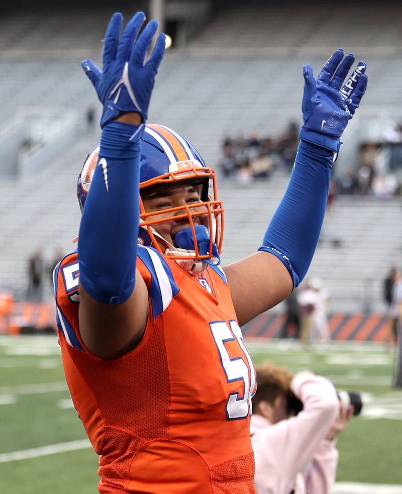 East St. Louis' Shamon Hamilton celebrates as time runs down in their IHSA Class 6A state championship win over Prairie Ridge Saturday, Nov. 26, 2022, in Memorial Stadium at the University of Illinois in Champaign.