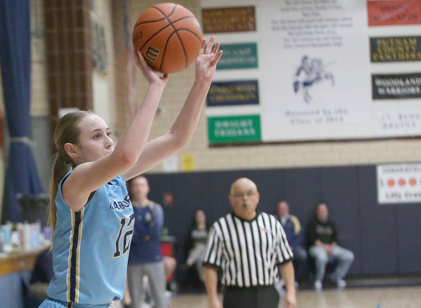 Marquette's Lily Craig shoots a jump shot against St. Bede during the Class 1A Regional semifinal game on Monday, Feb,. 12, 2024 in Bader Gym.