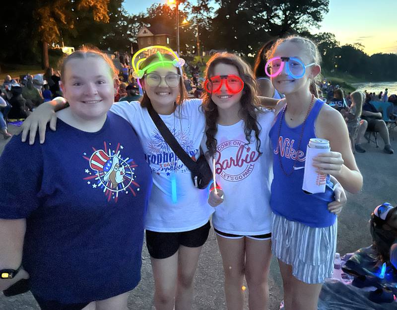 Helen Brennen 18, of Kentucky, Reece Engalsdo, 11, of Morrison, Mia Graham, 12, of Sterling, and Leena Hanraham, 12, of Prophetstown, were dressed for the occasion as they waited for the fireworks to begin at Prophetstown State Park on Saturday, July 6, 2024.