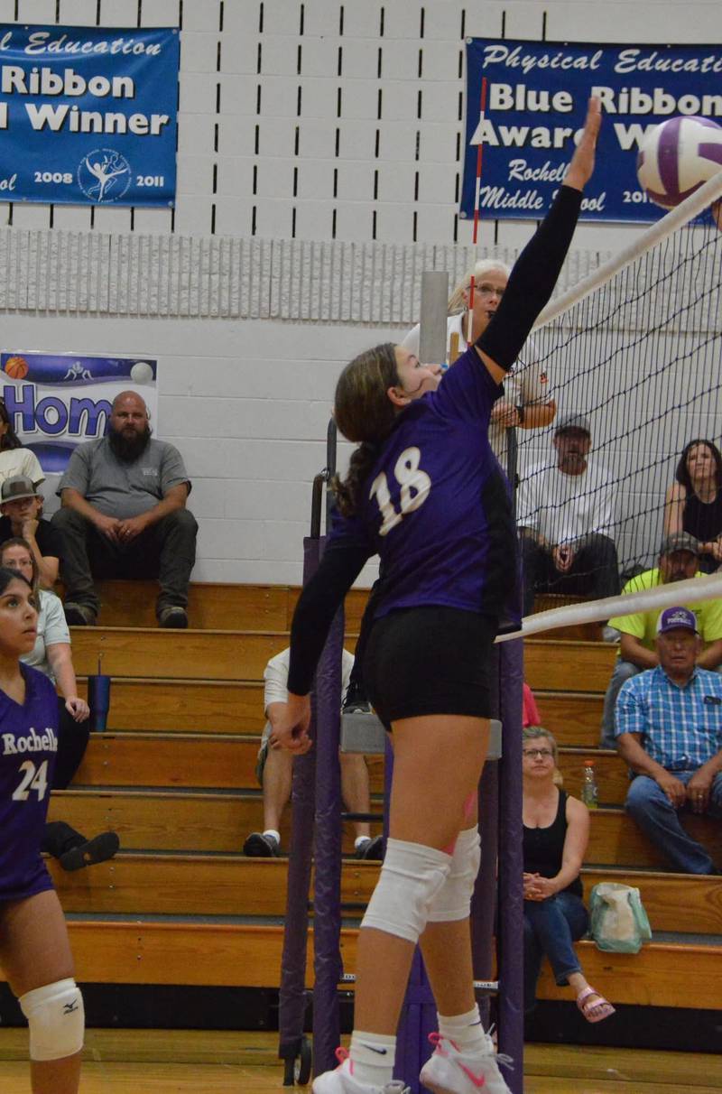Rochelle's Tinlea Sitter hits the ball over the net during an eighth-grade volleyball match. Rochelle won 13-25, 25-16, 25-20.