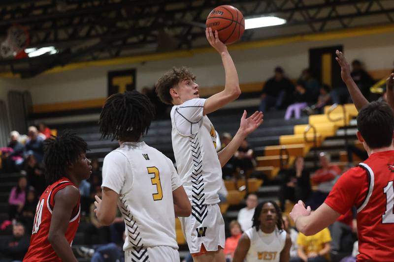 Joliet West’s Luke Grevengoed floats a shot against Yorkville on Friday, Jan. 5th, 2024. in Joliet.