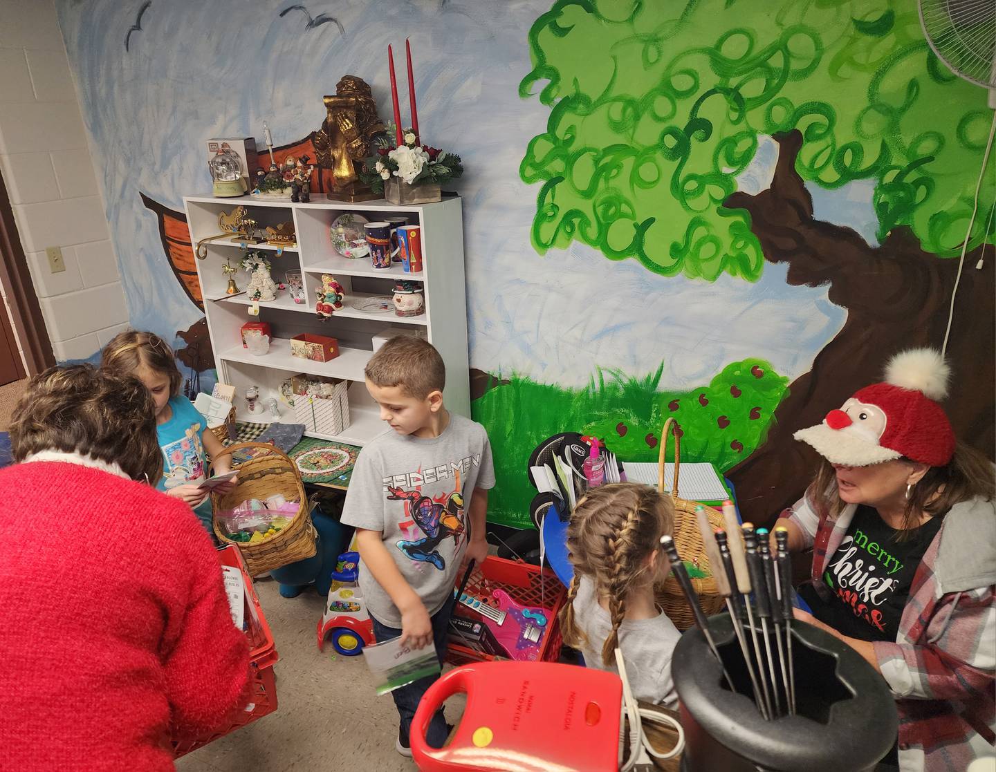 While the day was meaningful to the kids, who spent time telling everyone who would listen who they were buying a gift for, the day might have meant even more to Ginny Becker and the many helpful hands of the La Moille Second Chance Shop.