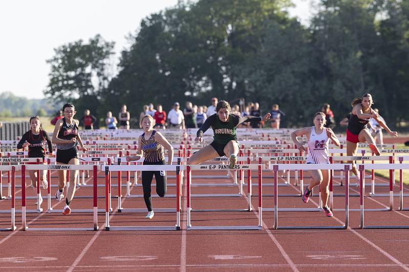 St. Bede’s Lily Bosnich clears the final hurdle for a win in the 100 hurdles Wednesday, May 13, 2026, during the Class 1A Erie Sectional meet.