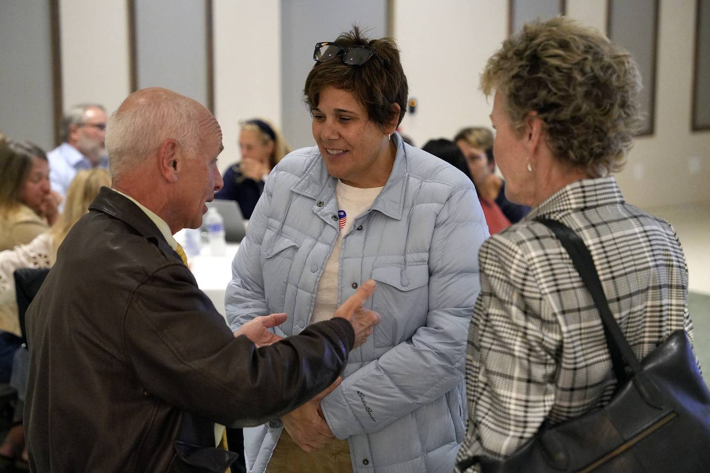 Will County Executive Jennifer Bertino-Tarrant, center, is seen at the Democratic watch party at IBEW Local 176 hall on Tuesday Nov. 5, 2024 in Joliet, Ill.