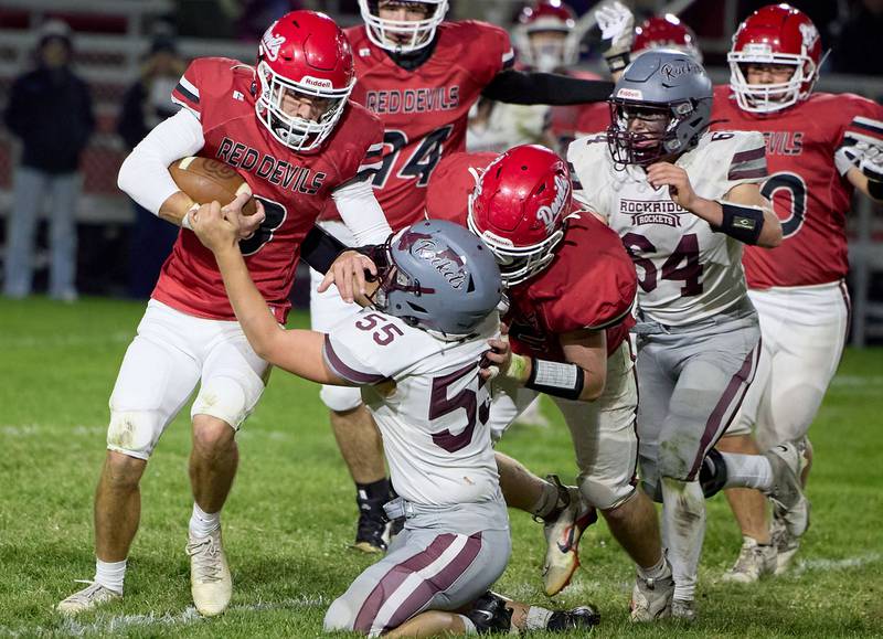 Hall's Braden Curran runs the ball against Rockridge on Friday, Oct. 24, 2025 at Richard Nesti Stadium.