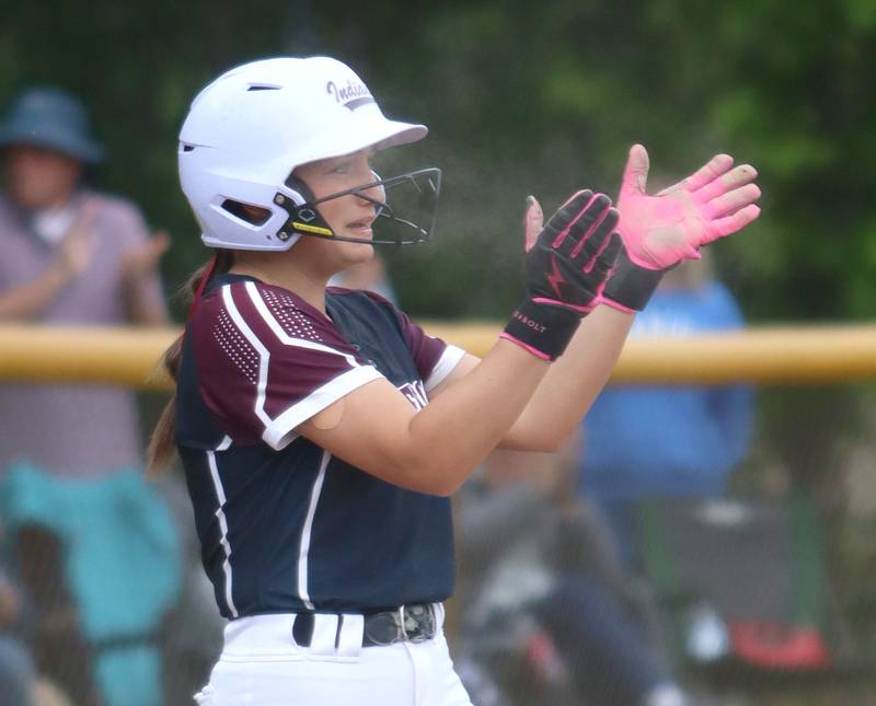 Marengo’s Gabby Christopher celebrates arriving safely at third base against Aurora Central Catholic in varsity girls softball IHSA Class 2A Regional Title Game action on Friday, May 22, 2026 at Raymond Benoy Field on the campus of Marian Central High School in Woodstock.
