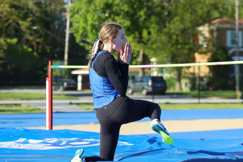 Lincoln-Way East's Teagan Knipper reacts to qualifying for state in the high jump during the IHSA Class 3A Chicago Heights Girls Track and Field Sectional at Bloom High School on Wednesday, May 13, 2026.
