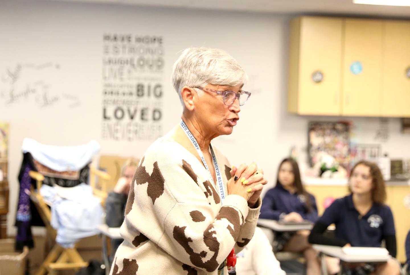 Nazareth Academy’s Kim White teaches a speech class at the La Grange Park school. White has also taught drama at the school for over 30 years.