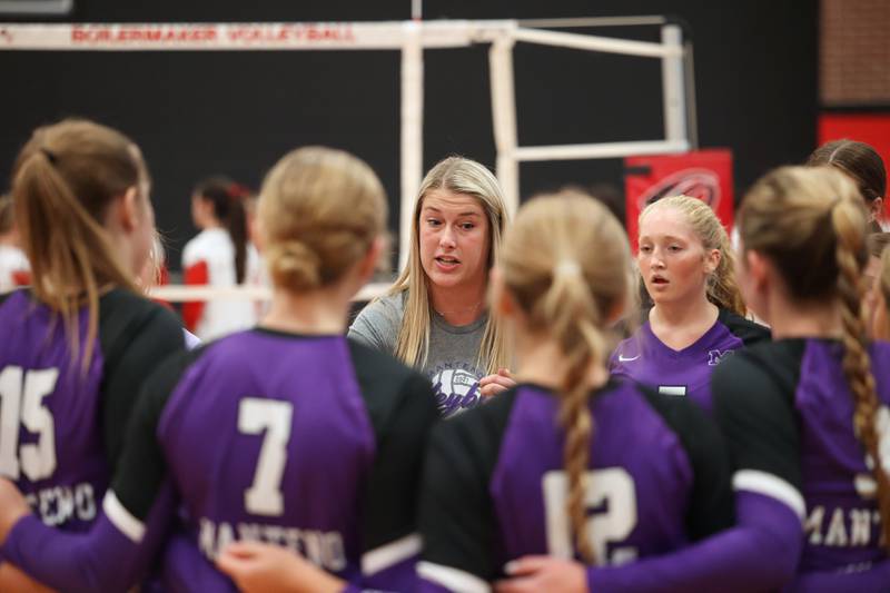 Manteno head coach Alexis Hosselton talks with her team in a timeout during the Panthers' victory in three sets over Bradley-Bourbonnais, 25-21, 23-25, 25-17, on Monday, Sept. 15, 2025.